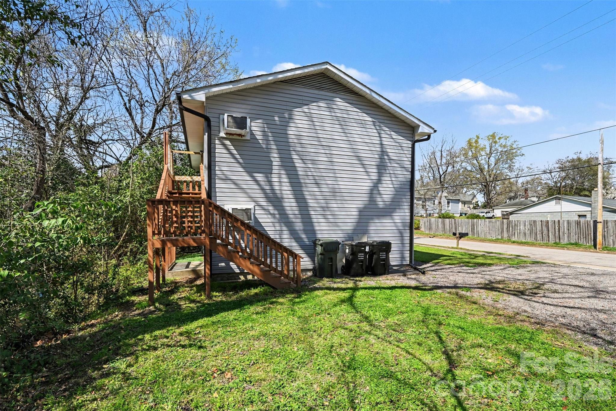 270-272 Spring Street Southwest Concord, NC 28025 - Photo 25 of 26 a front view of a house with a yard