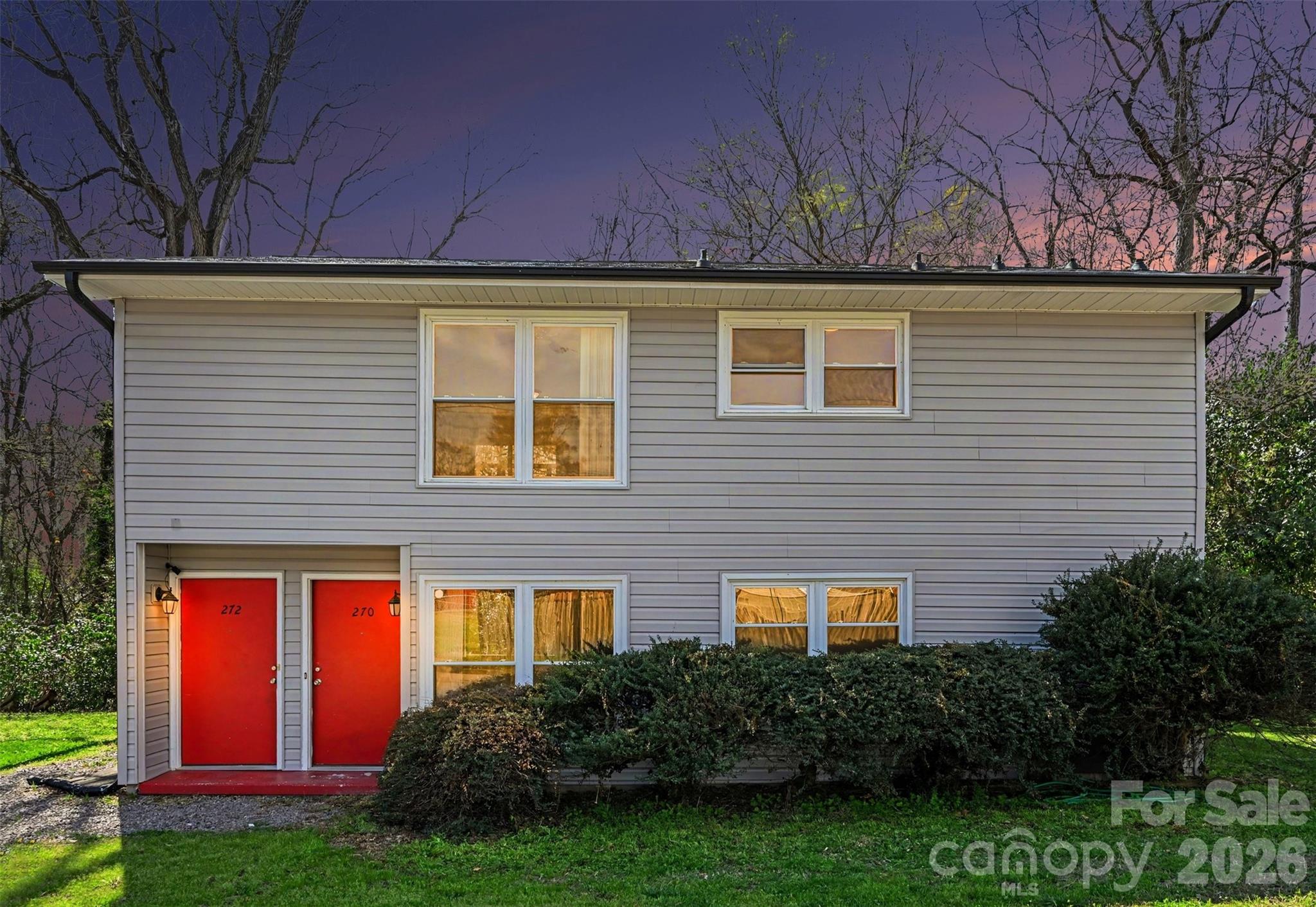 270-272 Spring Street Southwest Concord, NC 28025 - Photo 26 of 26 a front view of house with yard