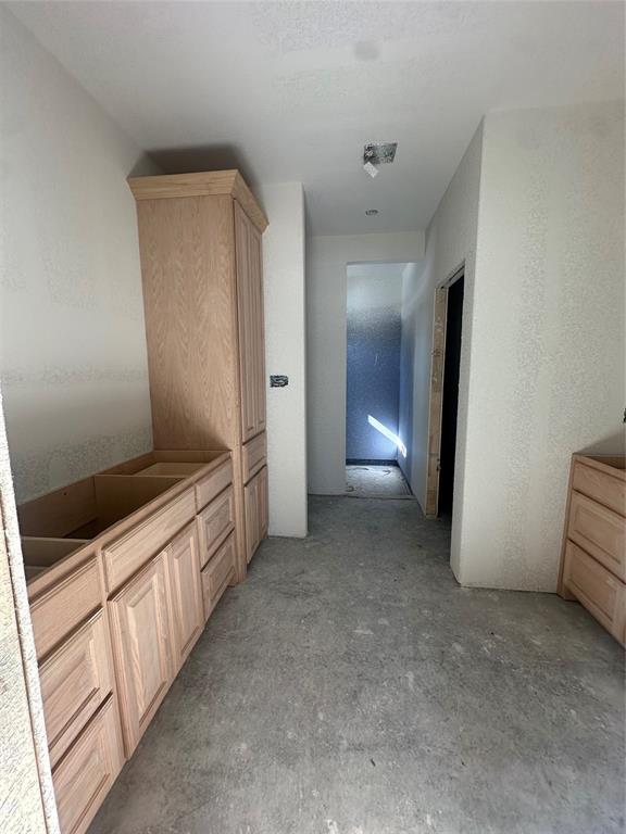 518 Strong Street Bowie, TX 76230 - Photo 6 of 14 a view of a hallway