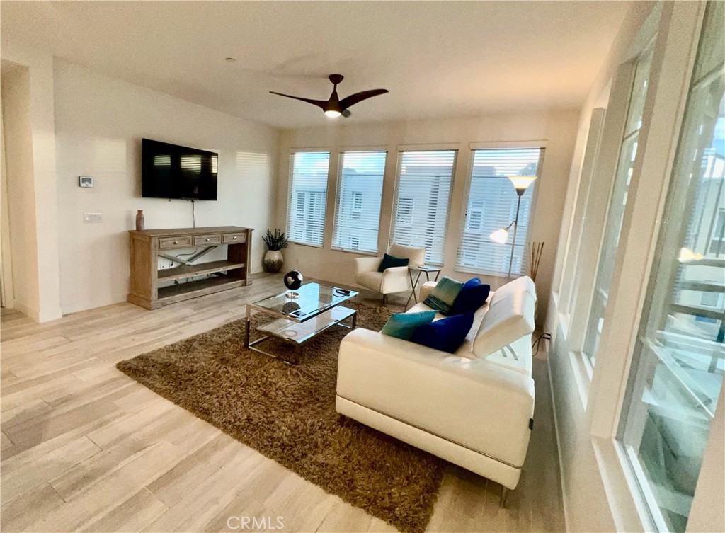 766 Doheny Way Dana Point, CA 92629 - Photo 3 of 8 a living room with furniture and a flat screen tv