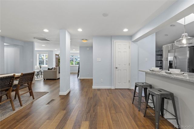 a view of a kitchen and dining room