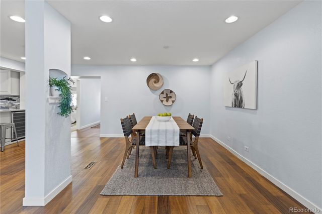 a workspace with furniture and wooden floor
