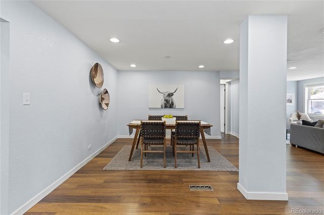 a view of a living room and dining room
