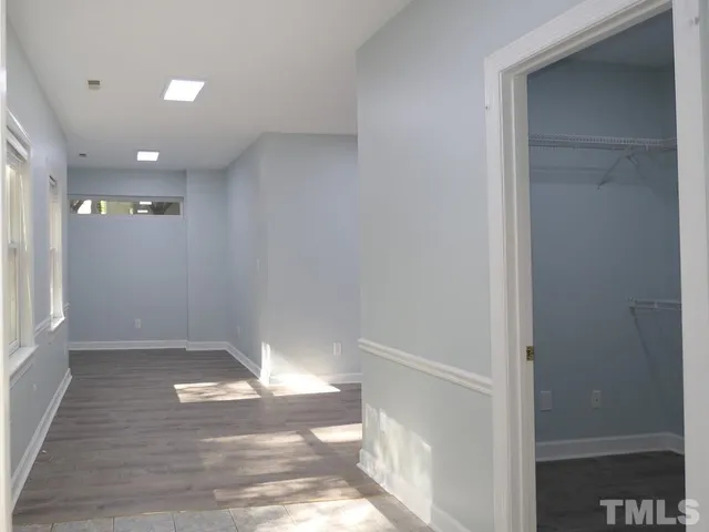 a view of entryway with wooden floor