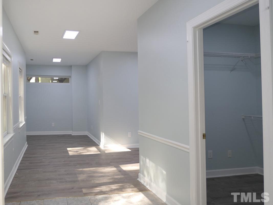 304 Columbia Place East Chapel Hill, NC 27516 - Photo 18 of 34 a view of entryway with wooden floor
