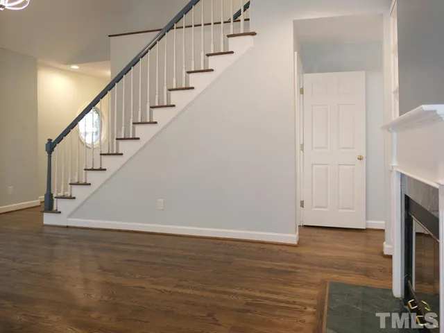 a view of entryway with wooden floor
