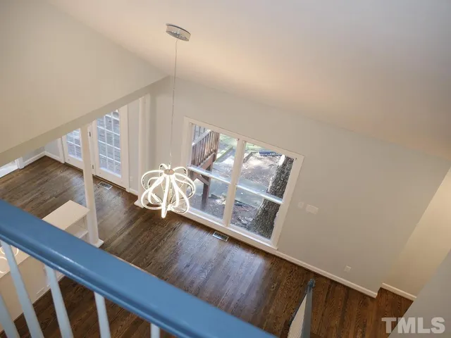 a view of living room with furniture and rug