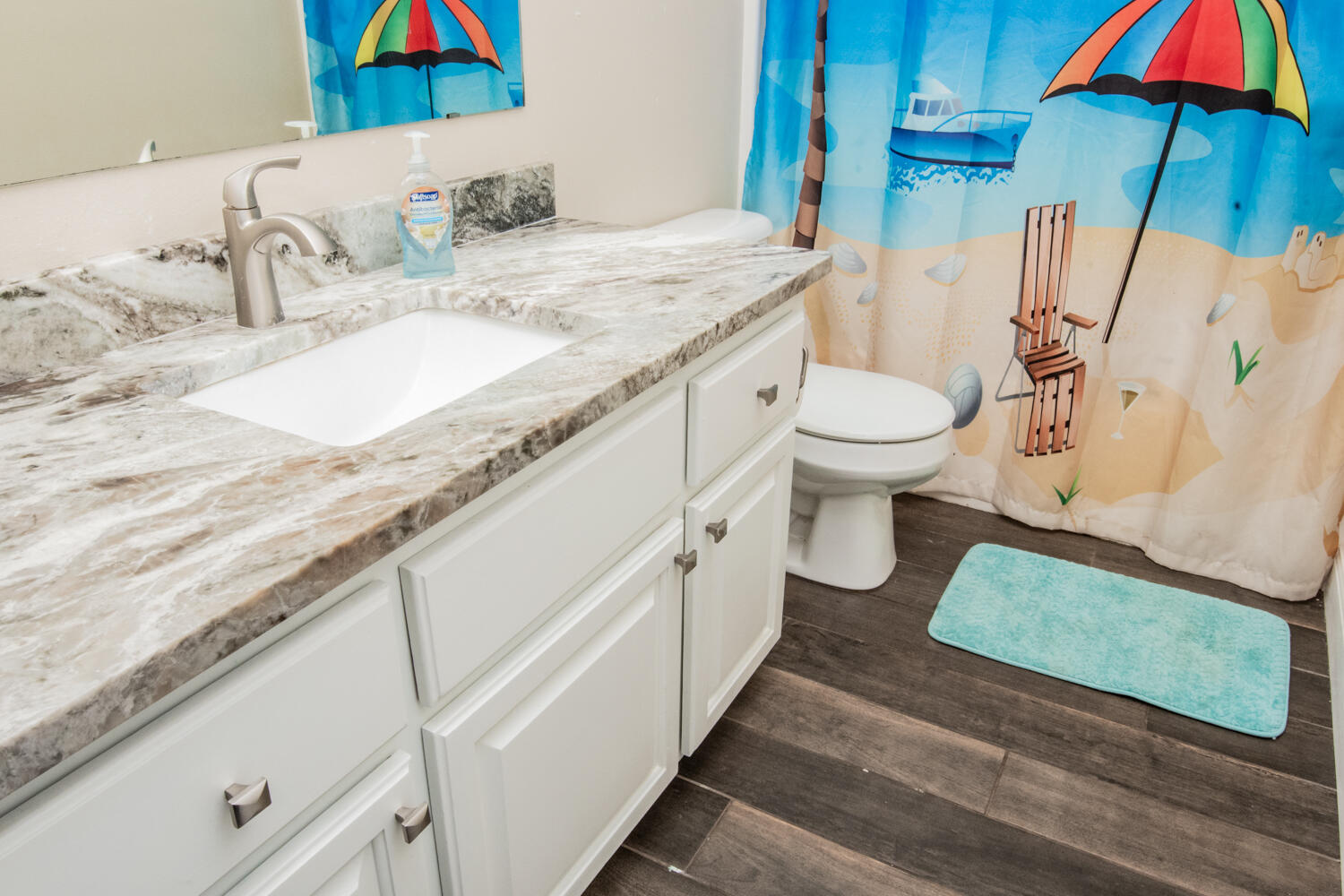 530 Vulpes Sanctuary Loop Crestview, FL 32536 - Photo 17 of 31 a bathroom with a granite countertop sink and a mirror