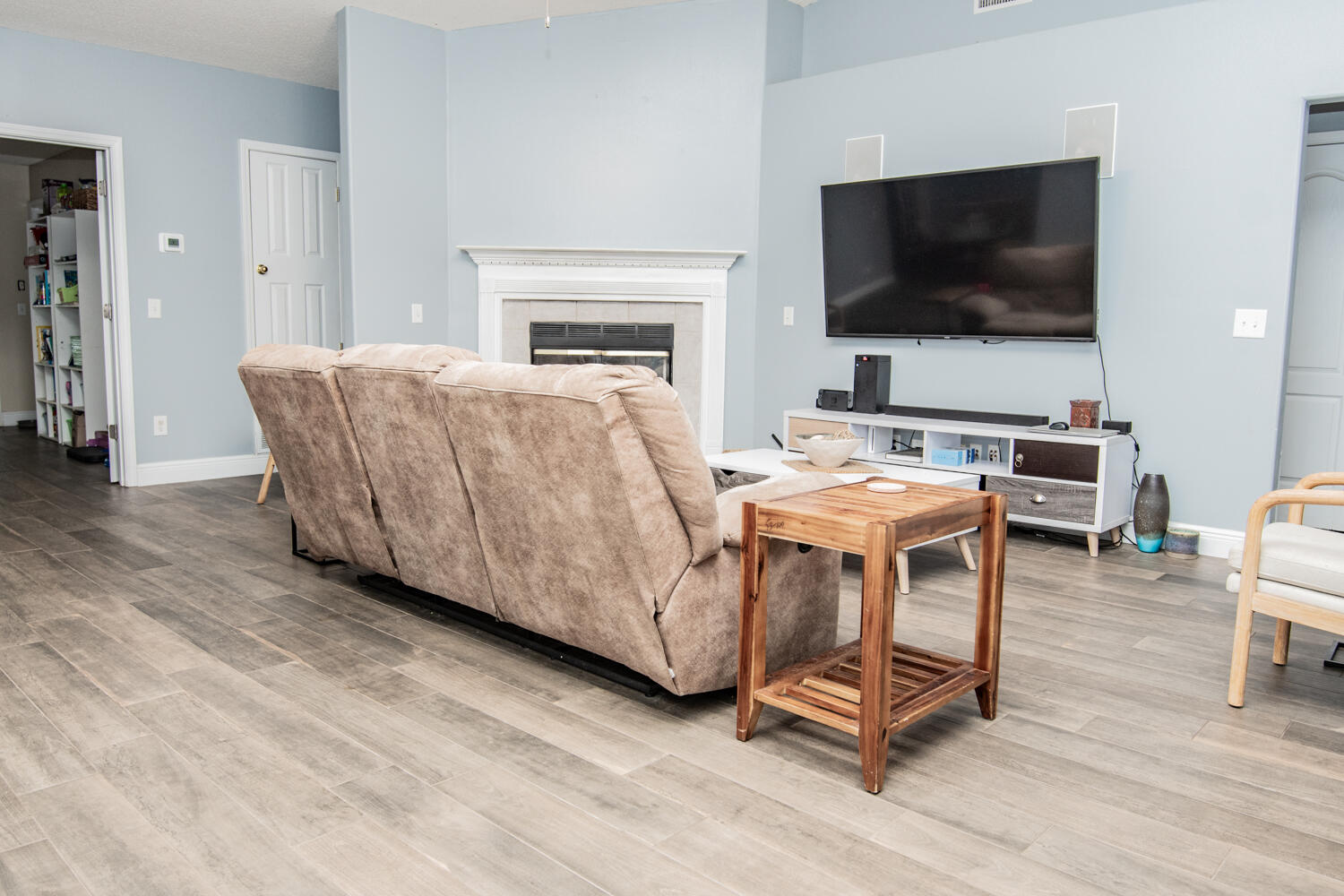 530 Vulpes Sanctuary Loop Crestview, FL 32536 - Photo 7 of 31 a living room with furniture and a flat screen tv