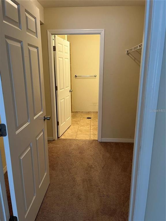 4600 East Moody Boulevard, Unit 1A Bunnell, FL 32110 - Photo 5 of 7 a view of entryway with a tub and a door