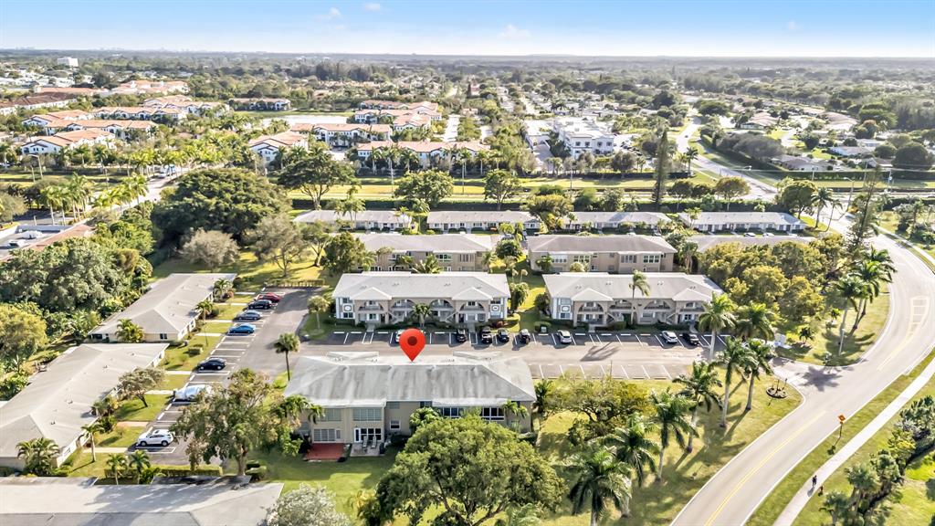 13950 Vía Flora, Unit B Delray Beach, FL 33484 - Photo 18 of 28 a view of a city