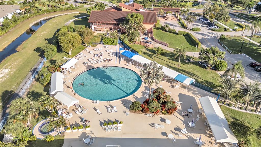 13950 Vía Flora, Unit B Delray Beach, FL 33484 - Photo 22 of 28 an aerial view of a swimming pool