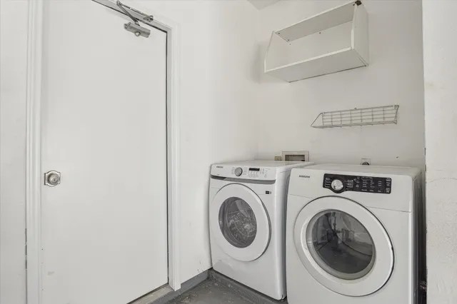 a utility room with dryer and washer