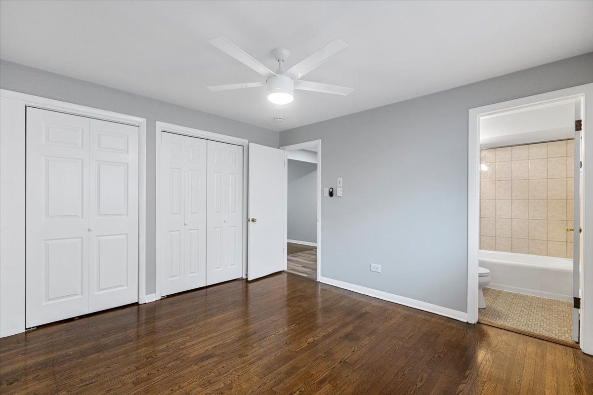 6250 West 64th Place, Unit 103 Chicago, IL 60638 - Photo 20 of 28 a view of an empty room with wooden floor