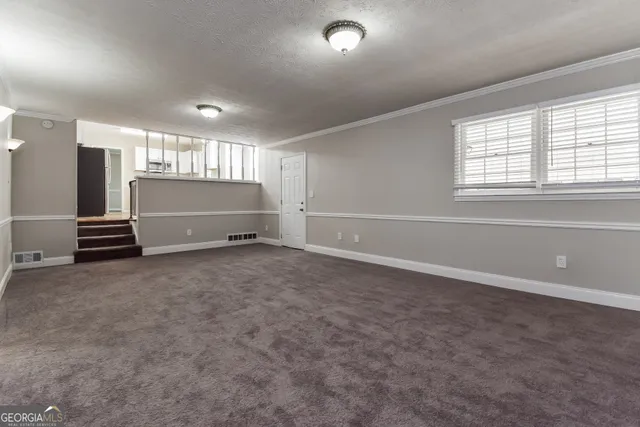 an empty room with windows