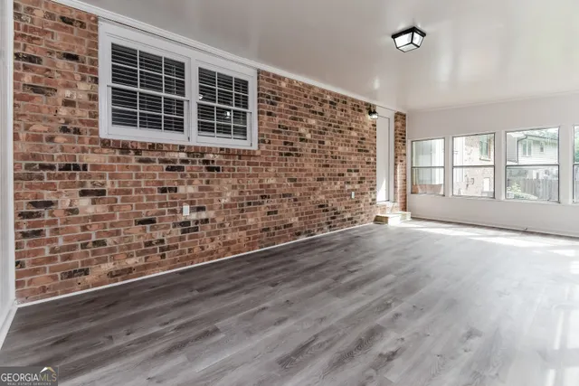 en empty room with windows