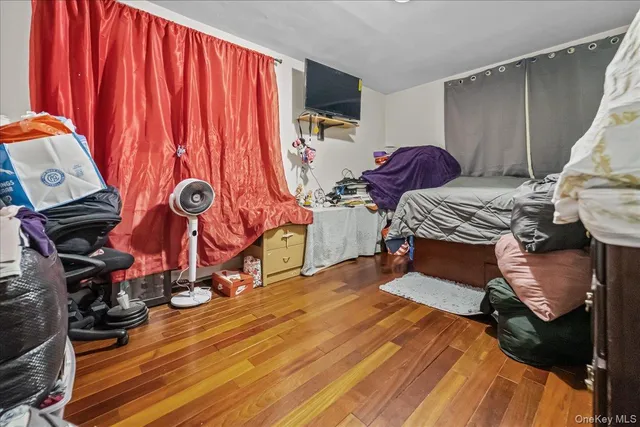 a bedroom with a bed and a closet