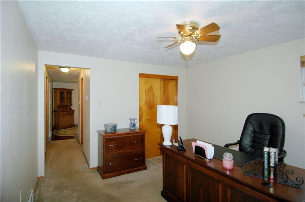 508 Sleepy Hollow Road Pittsburgh, PA 15228 - Photo 10 of 25 Den - Neutral wall-to-wall carpeting, paddle fan, closet.