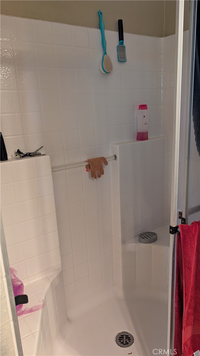 3424 West Washington Avenue, Unit 228 Santa Ana, CA 92703 - Photo 18 of 31 a bathroom with a shower