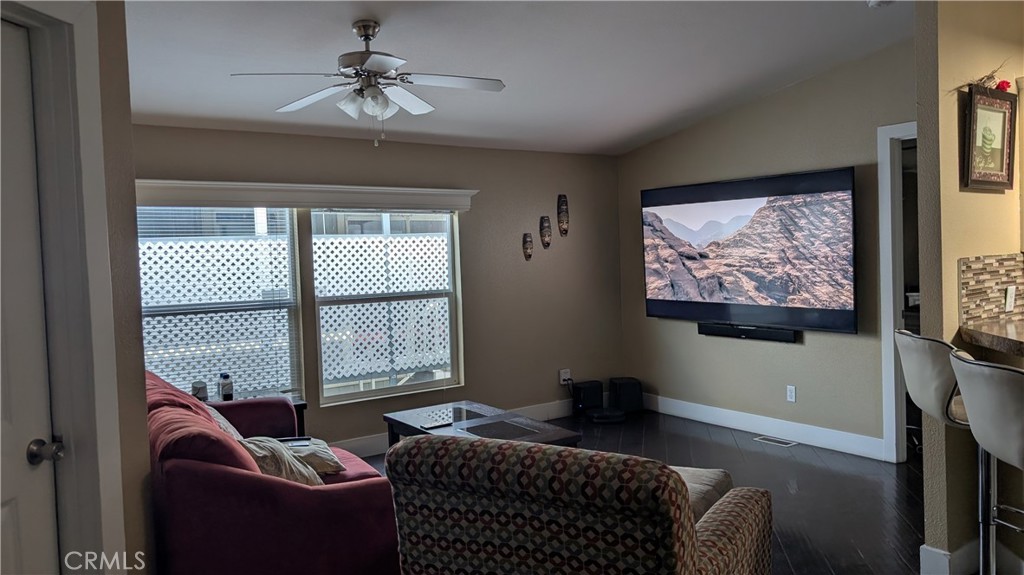 3424 West Washington Avenue, Unit 228 Santa Ana, CA 92703 - Photo 2 of 31 a bedroom with furniture and a window