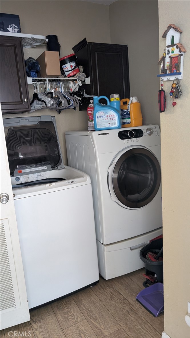 3424 West Washington Avenue, Unit 228 Santa Ana, CA 92703 - Photo 27 of 31 a utility room with dryer and washer