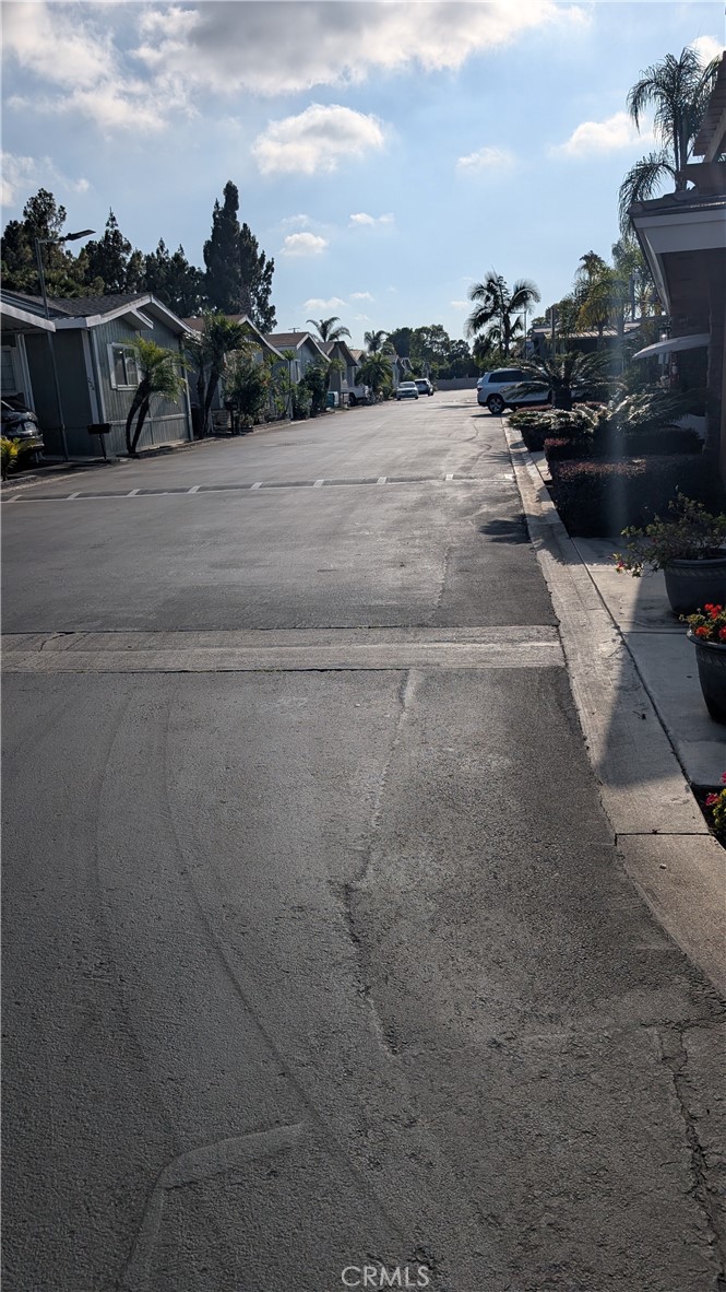 3424 West Washington Avenue, Unit 228 Santa Ana, CA 92703 - Photo 29 of 31 a view of outdoor space and yard