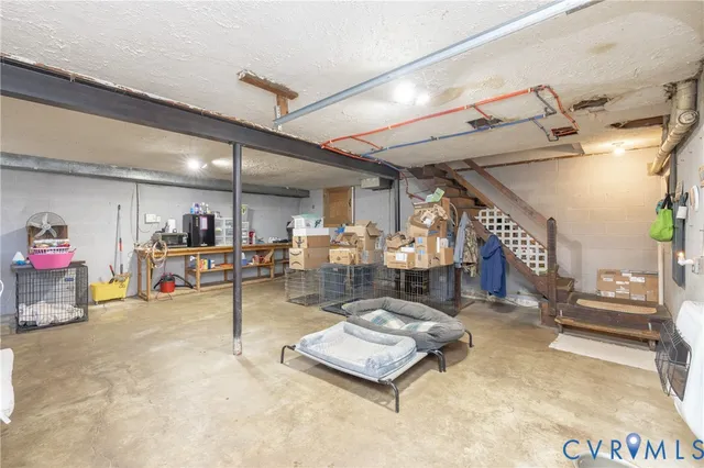 a living room with lots of furniture and a table