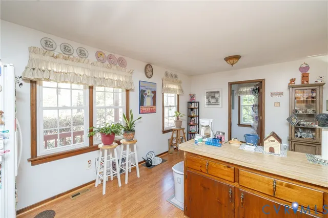 a view of a living room and dining room