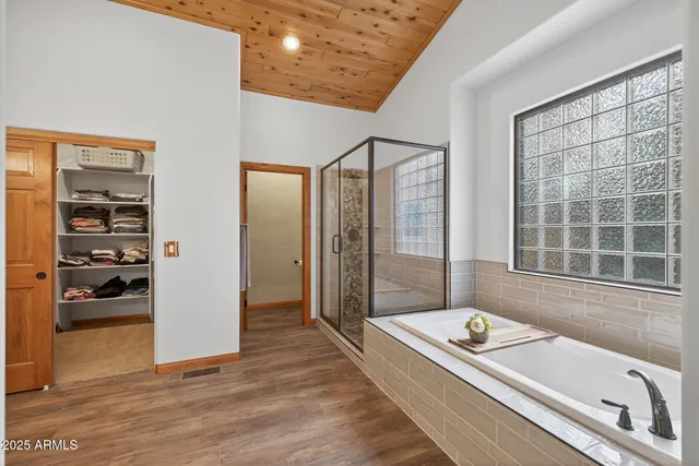 a view of a house with a large tree