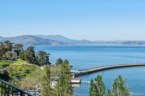a view of a lake with a mountain in the background
