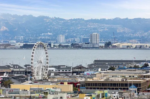 a view of a city and mountains