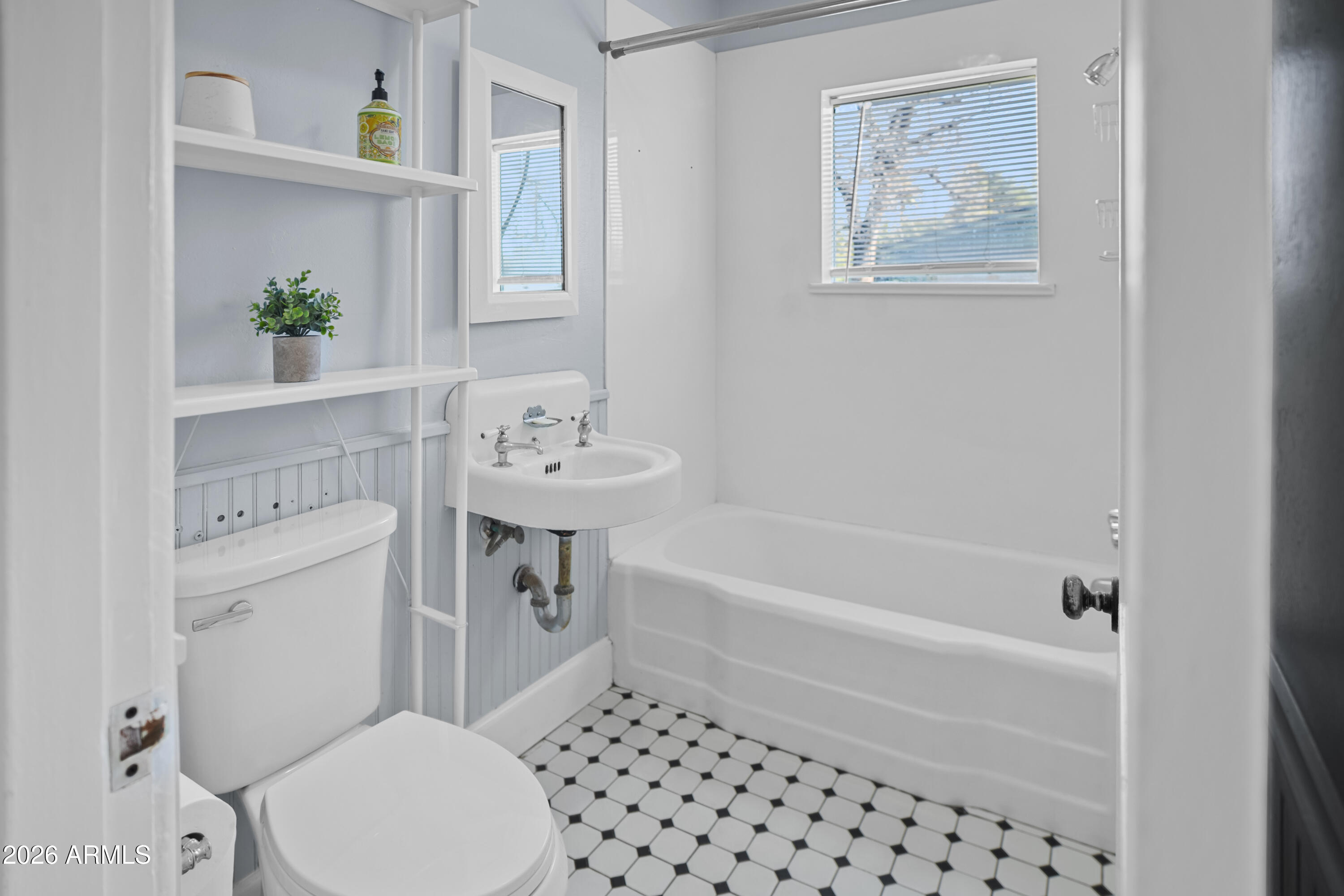 505 North Robson Mesa, AZ 85201 - Photo 11 of 27 a bathroom with a sink toilet and a bathtub