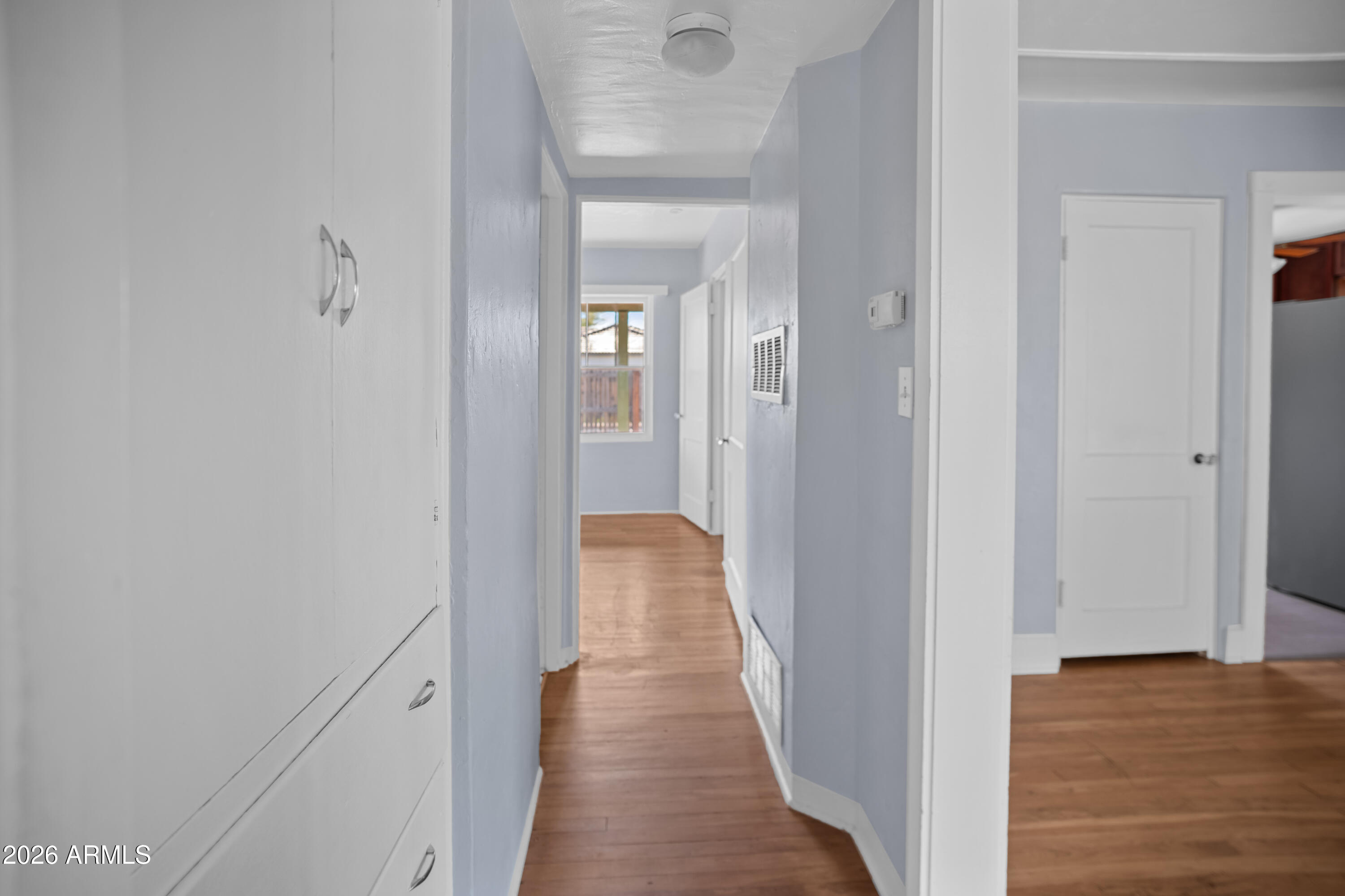 505 North Robson Mesa, AZ 85201 - Photo 15 of 27 a view of a hallway with wooden floor
