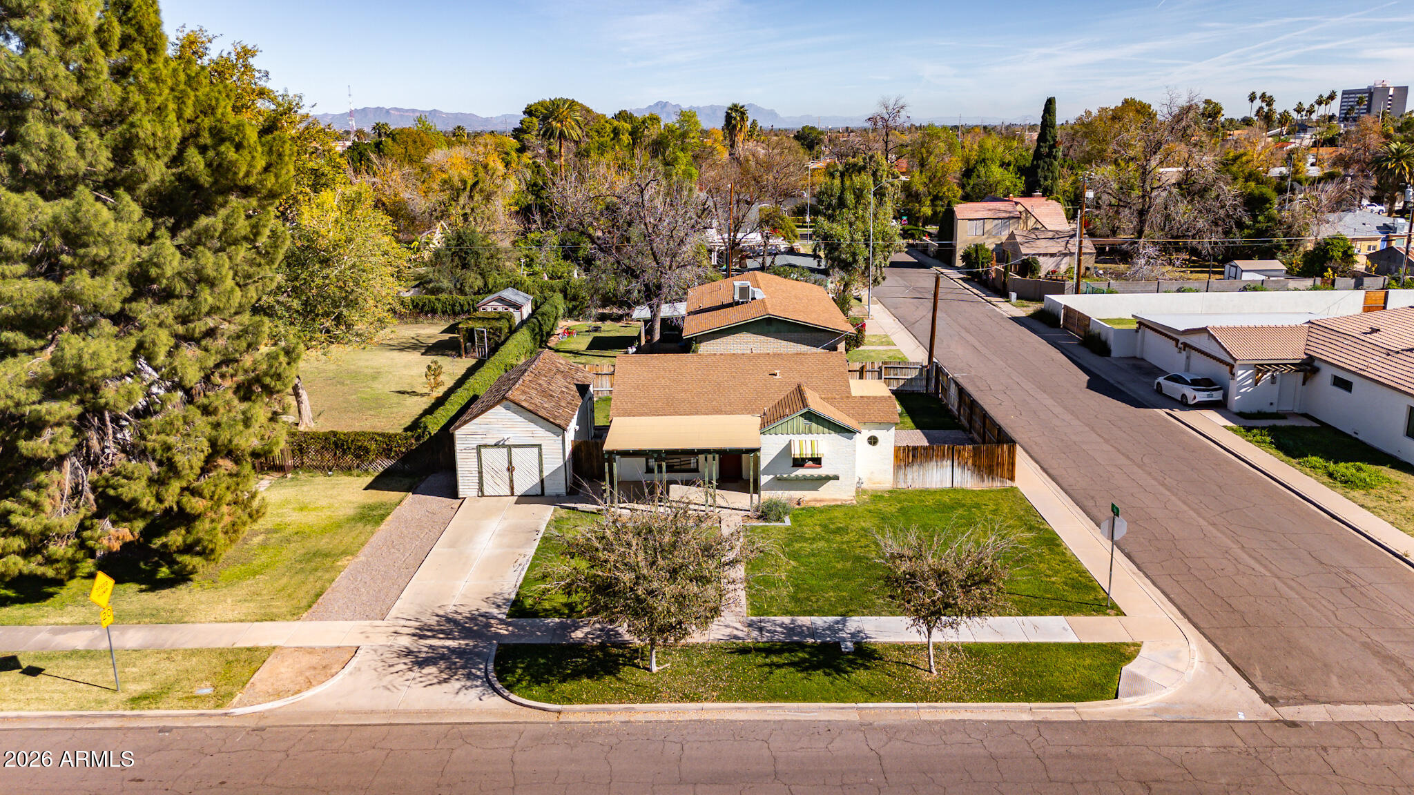 505 North Robson Mesa, AZ 85201 - Photo 25 of 27 an aerial view of a house with swimming pool large trees and buildings in the background
