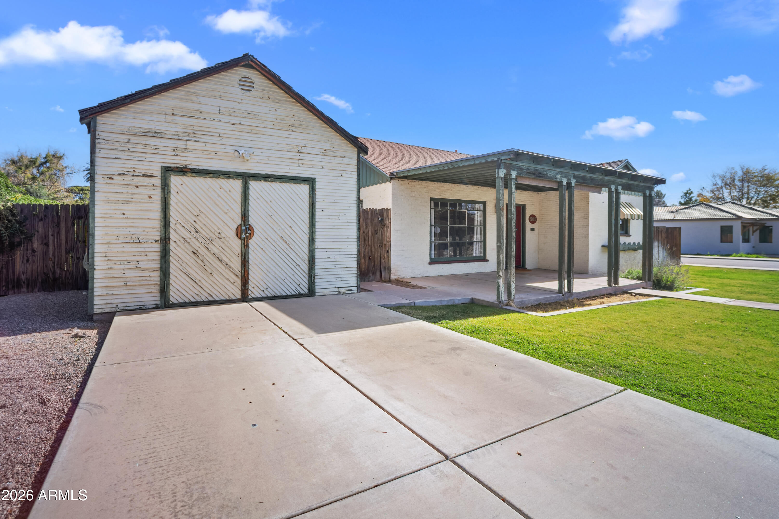505 North Robson Mesa, AZ 85201 - Photo 3 of 27 a front view of a house with garden