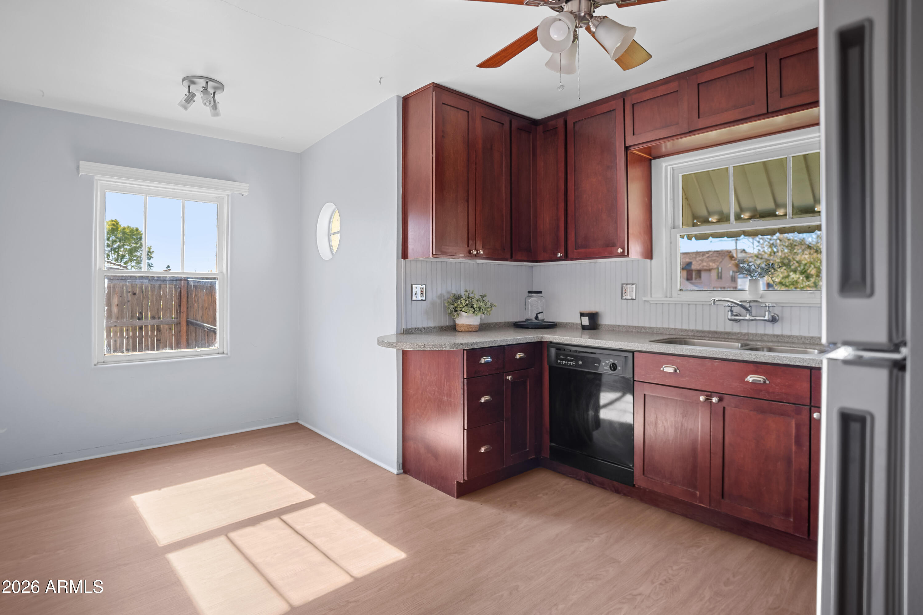 505 North Robson Mesa, AZ 85201 - Photo 8 of 27 a kitchen with a sink cabinets and window