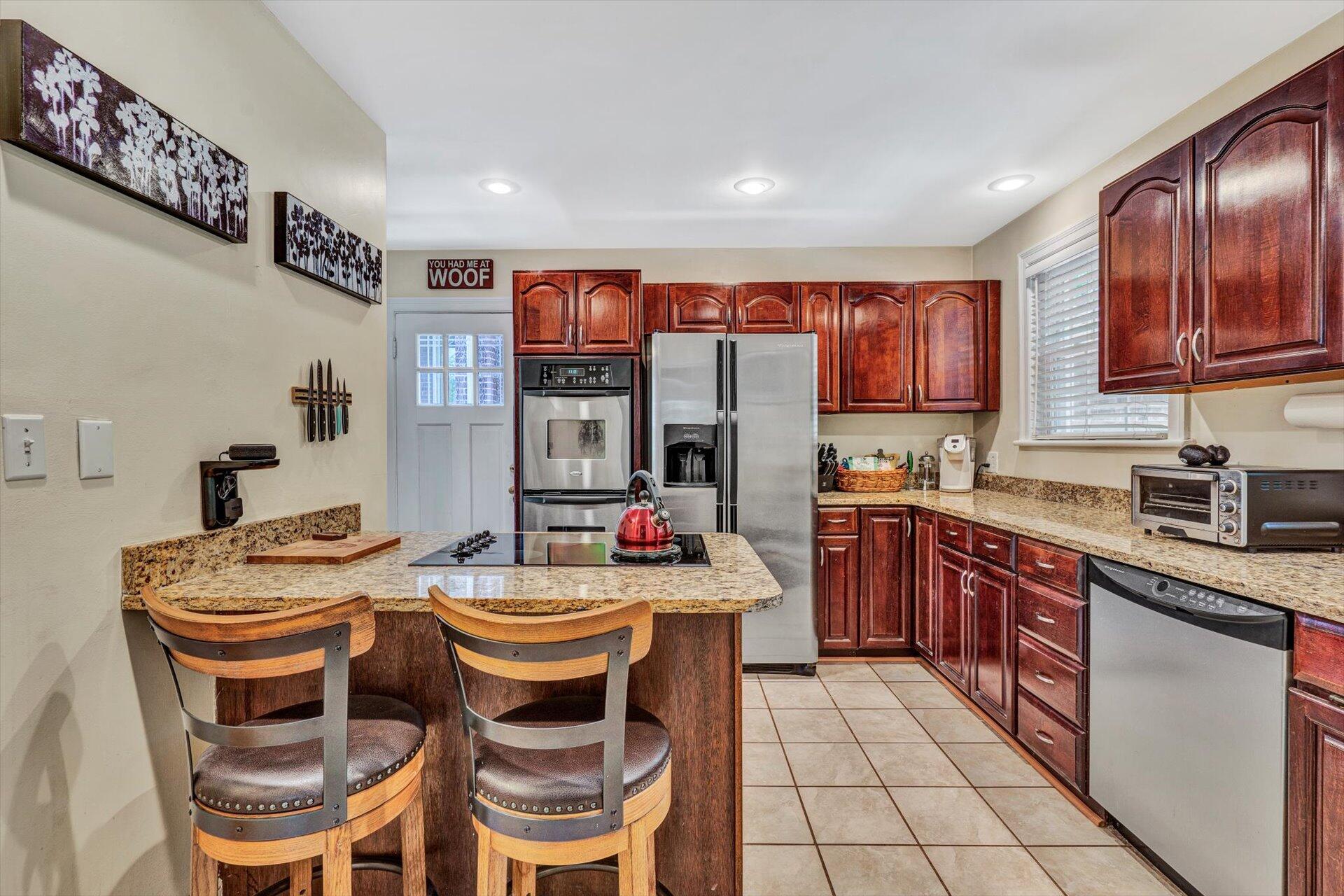 2303 Carter Road Southwest Roanoke, VA 24015 - Photo 10 of 38 Kitchen with Breakfast Bar