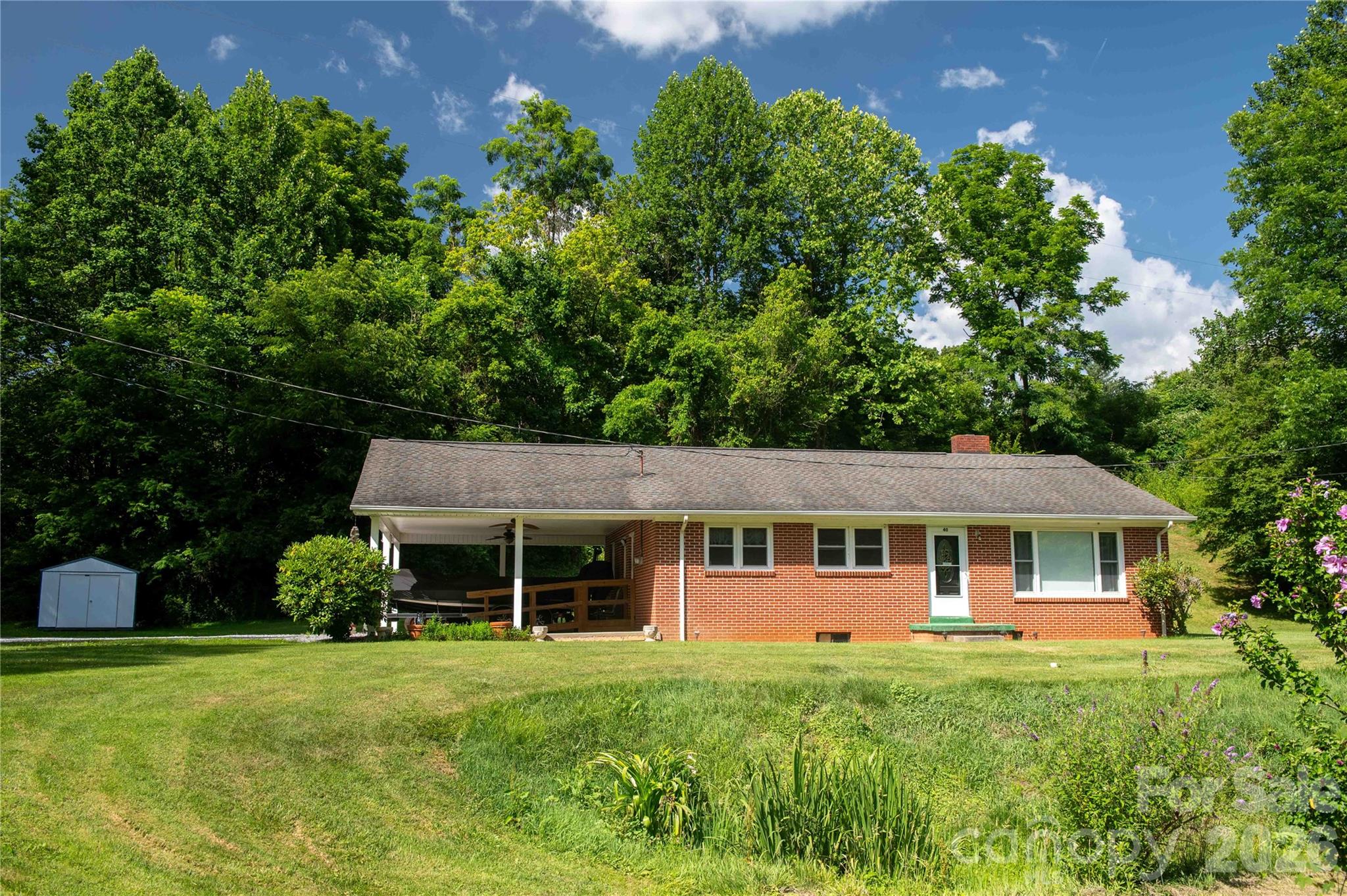 40 Double Island Road Burnsville, NC 28714 - Photo 37 of 38 a front view of a house with a yard
