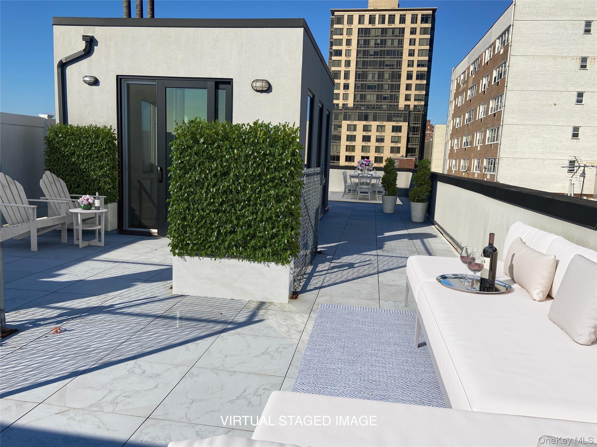 109-19 72nd Road, Unit PH7F Queens, NY 11375 - Photo 2 of 27 a living room with furniture