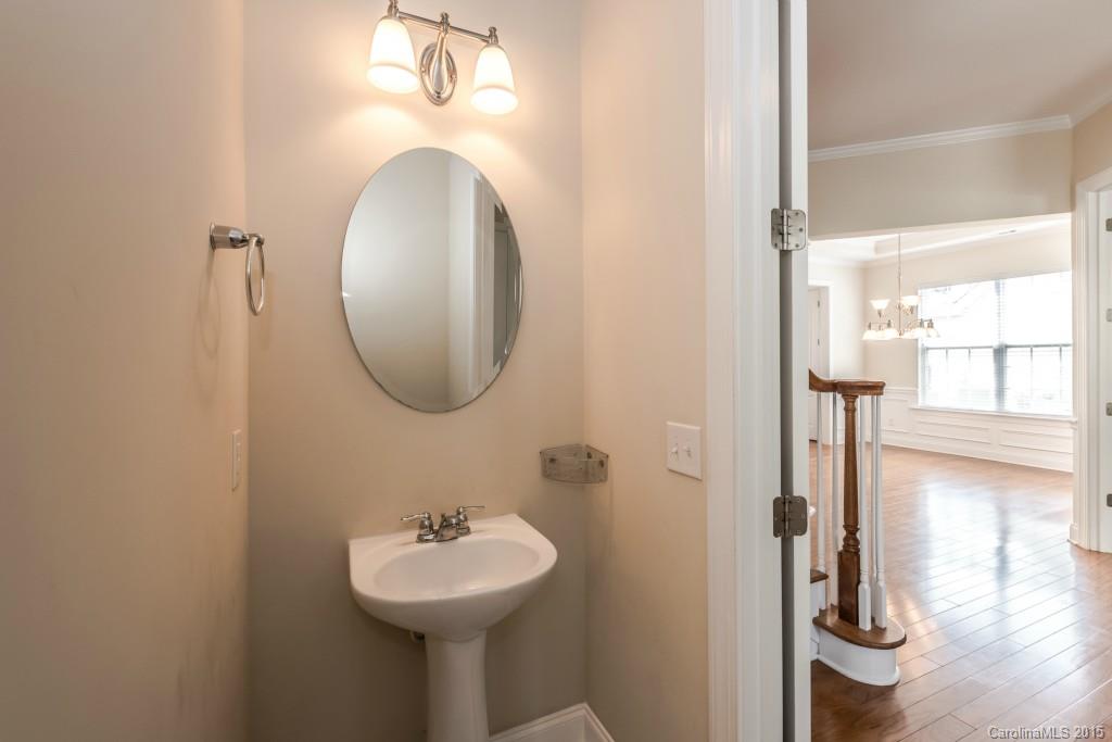 312 Miners Cove Way Fort Mill, SC 29708 - Photo 12 of 24 a bathroom with a sink and a mirror