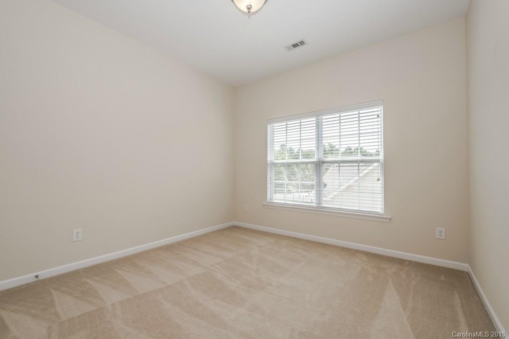 312 Miners Cove Way Fort Mill, SC 29708 - Photo 21 of 24 an empty room with a window