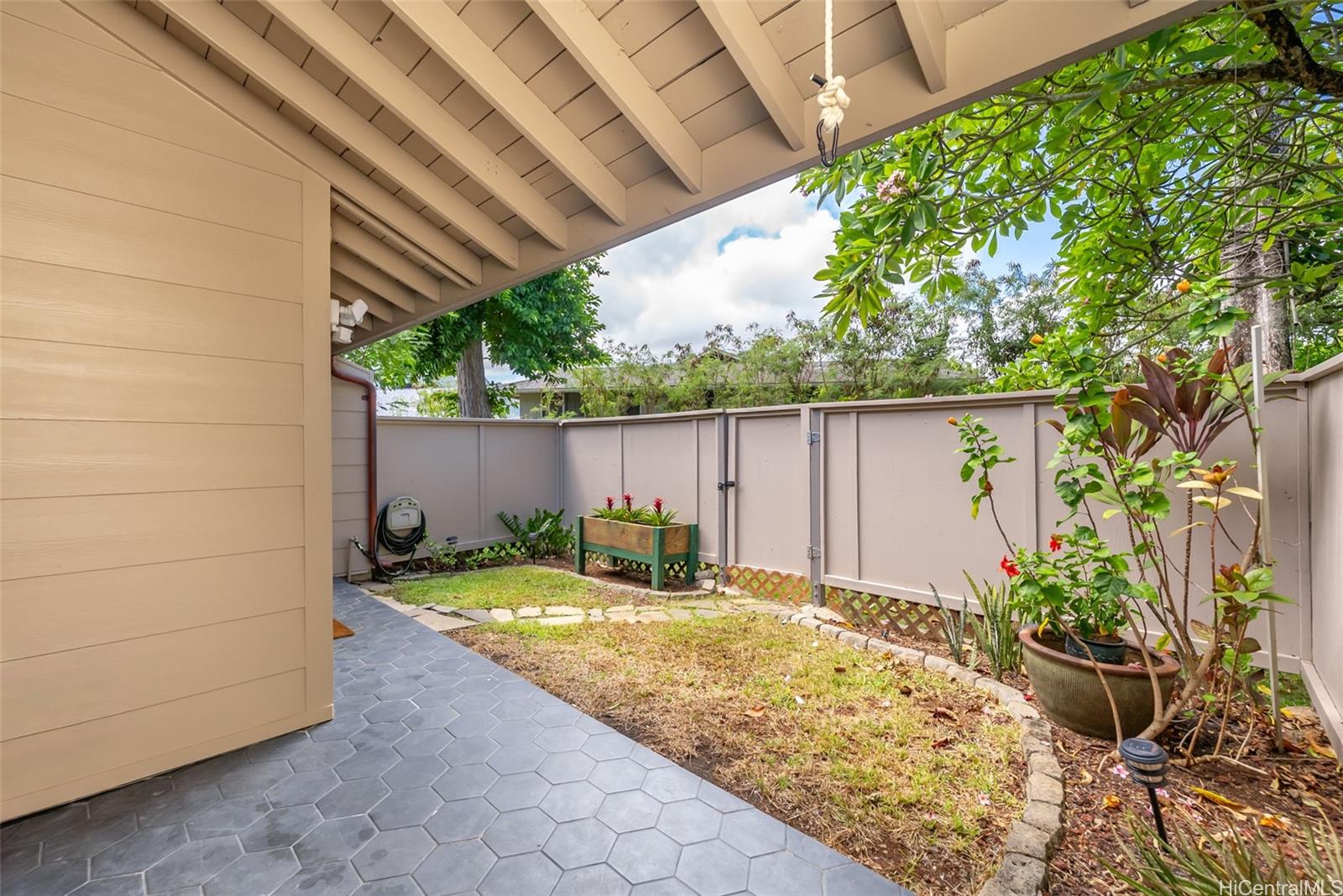 45-995 Wailele Road, Unit 55 Kaneohe, HI 96744 - Photo 16 of 24 a view of garden with patio