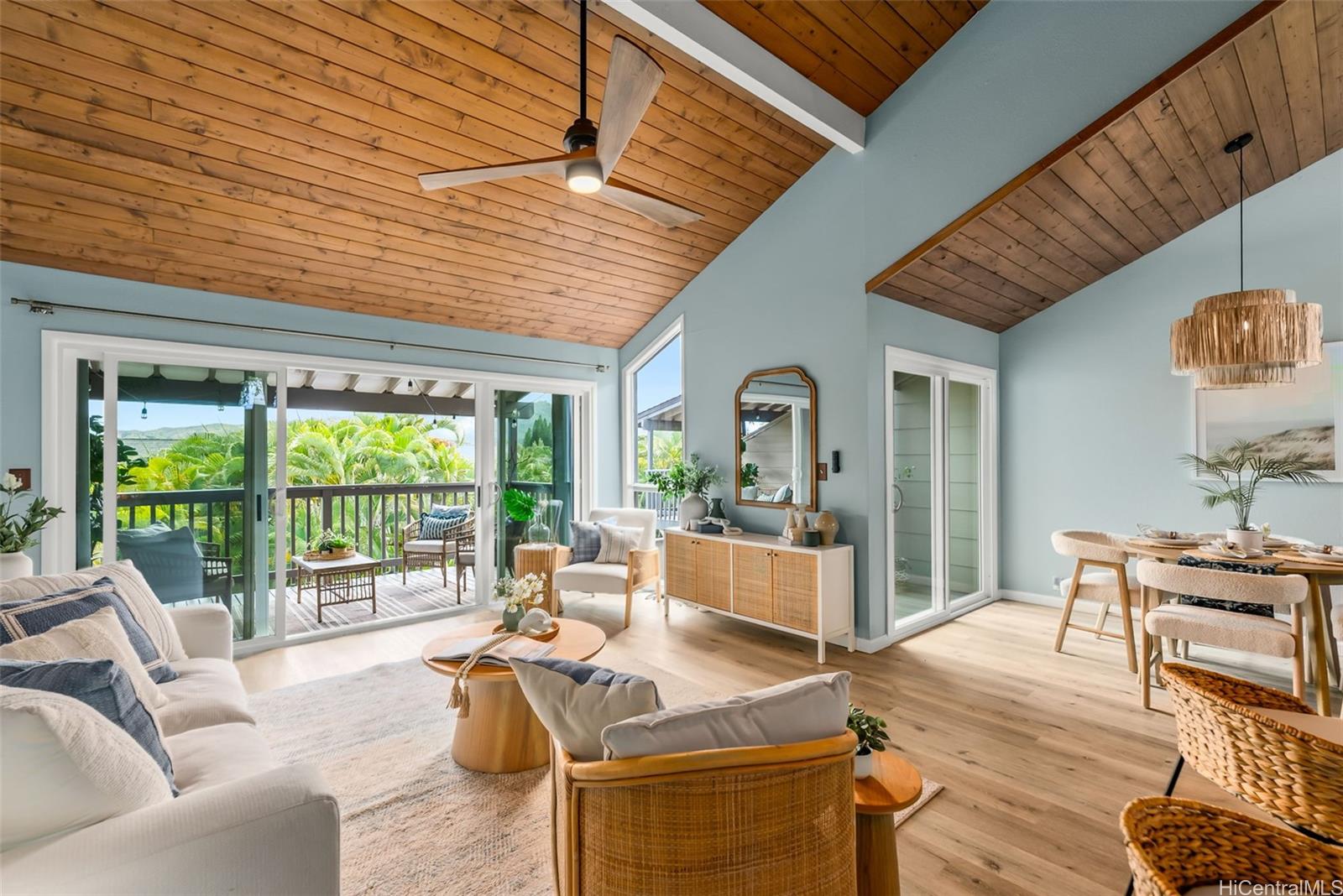 45-995 Wailele Road, Unit 55 Kaneohe, HI 96744 - Photo 2 of 24 a living room with furniture and a floor to ceiling window