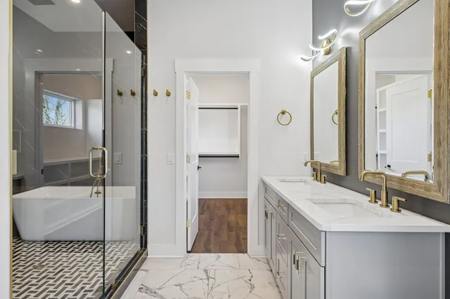 a kitchen with a stove a sink and a refrigerator