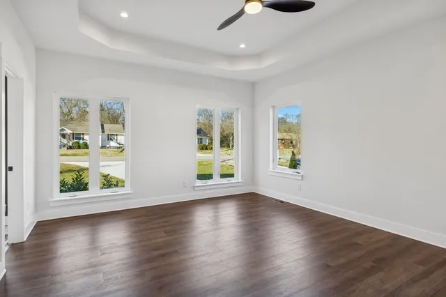 a bathroom with a bathtub and a toilet