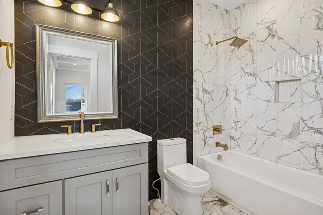 a view of a livingroom with furniture and window