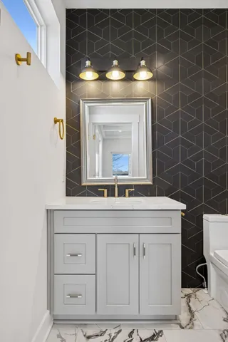 a room with furniture and air hockey table