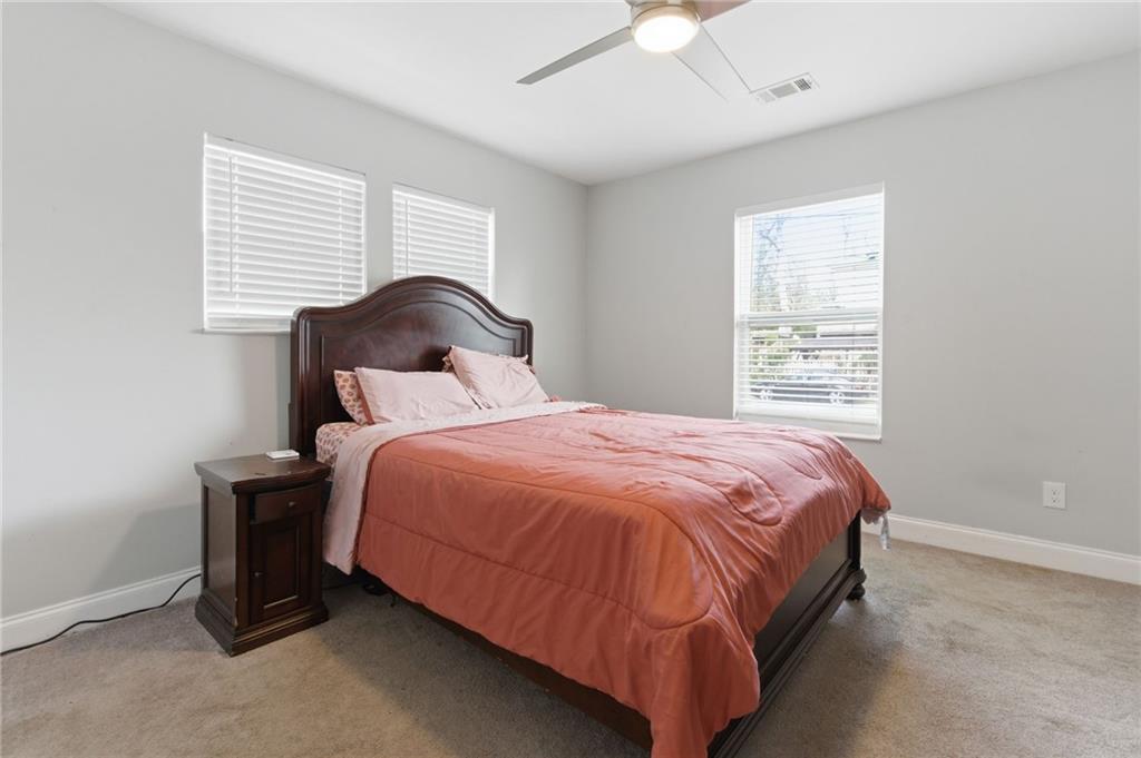 1690 Ware Avenue Atlanta, GA 30344 - Photo 11 of 25 a bedroom with a bed and a window