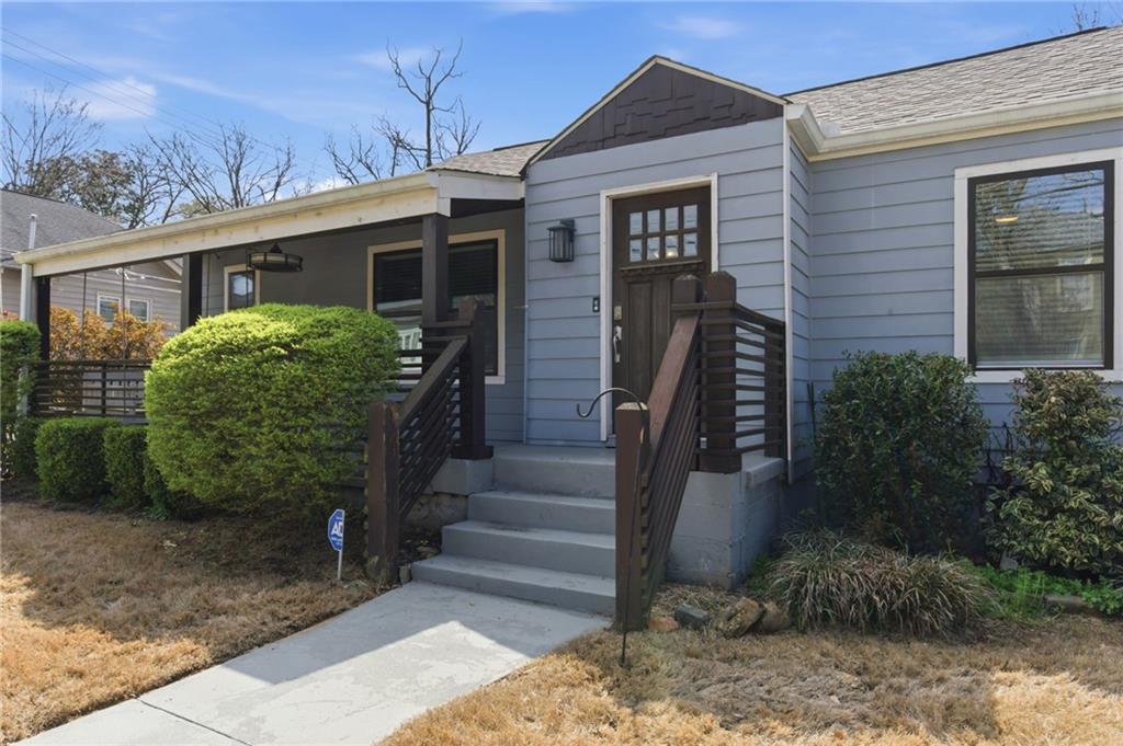1690 Ware Avenue Atlanta, GA 30344 - Photo 2 of 25 a front view of house with a garden
