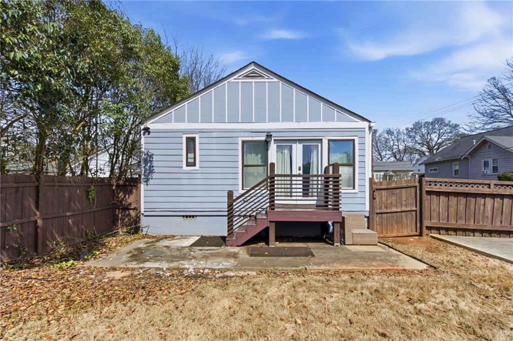 1690 Ware Avenue Atlanta, GA 30344 - Photo 23 of 25 a front view of a house with a yard